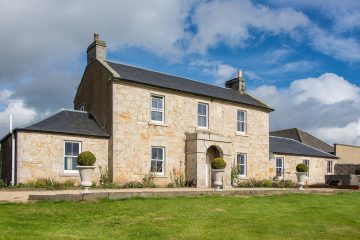 stone house with sash windows